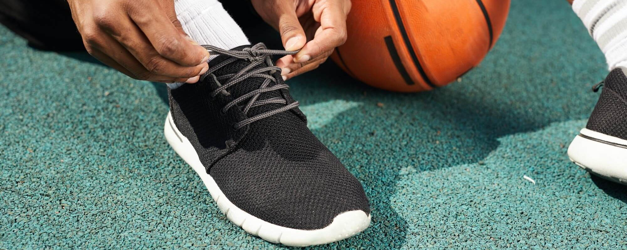 african-sportsman-tying-shoes-1.jpg